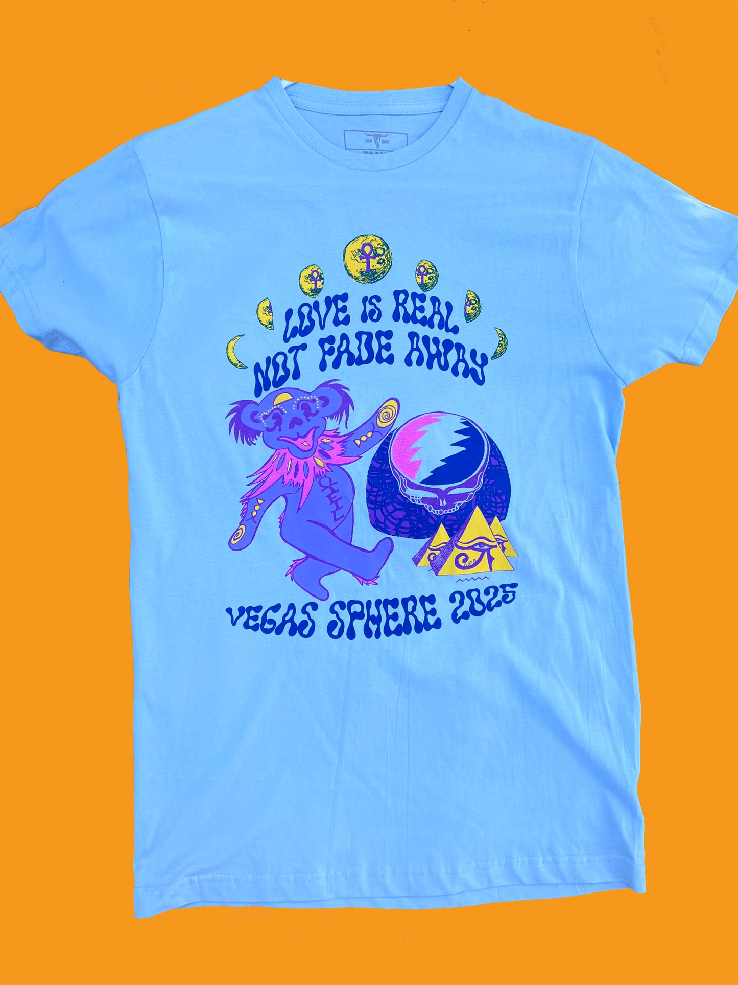 LOVE is REAL- NOT FADE AWAY Oteil Bear- blue short sleeve t-shirt